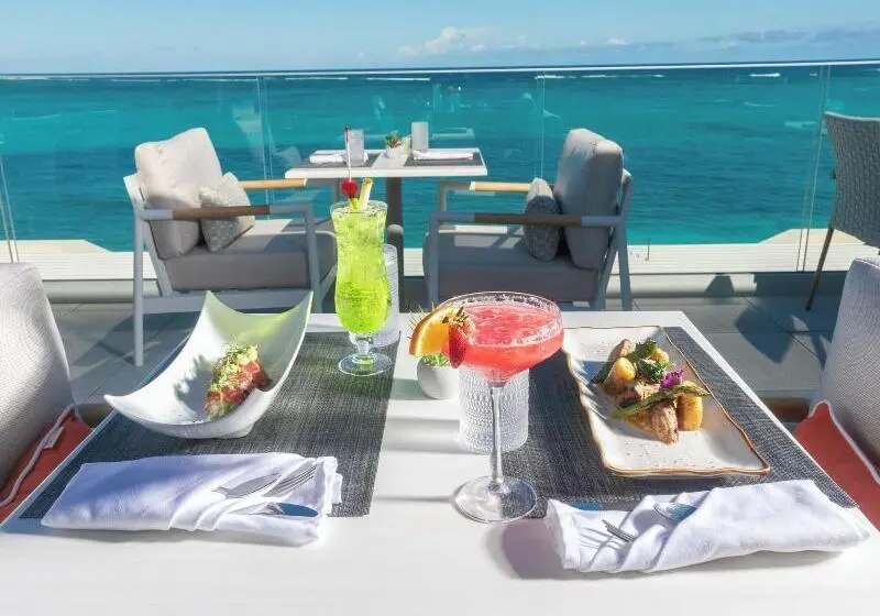 هتل Beachfront At Windsong On The Reef