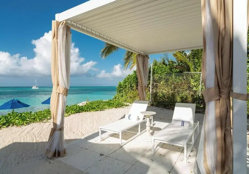 هتل Beachfront At Windsong On The Reef