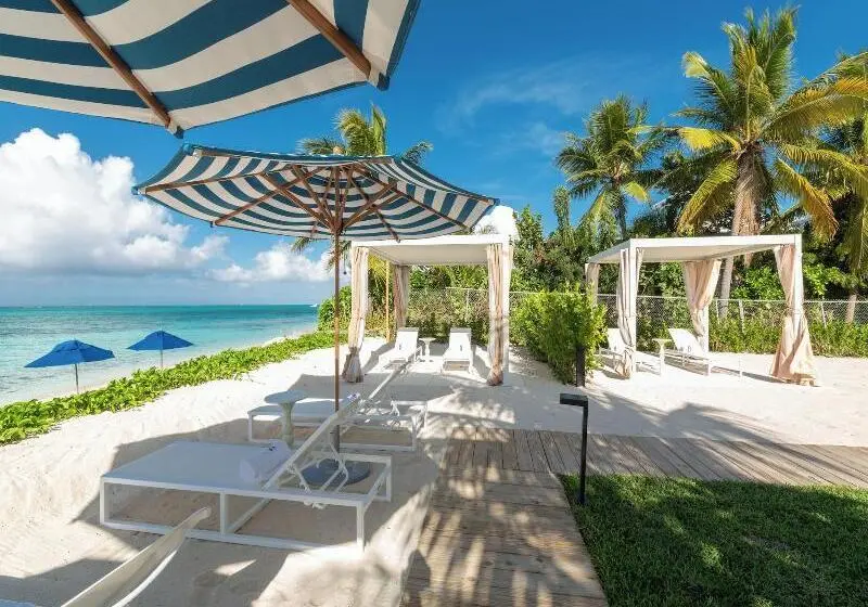 هتل Beachfront At Windsong On The Reef
