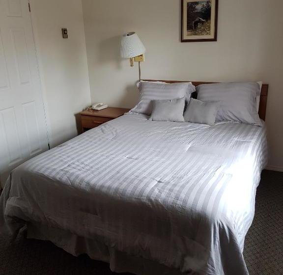 모텔 Covered Bridge Inn & Suites