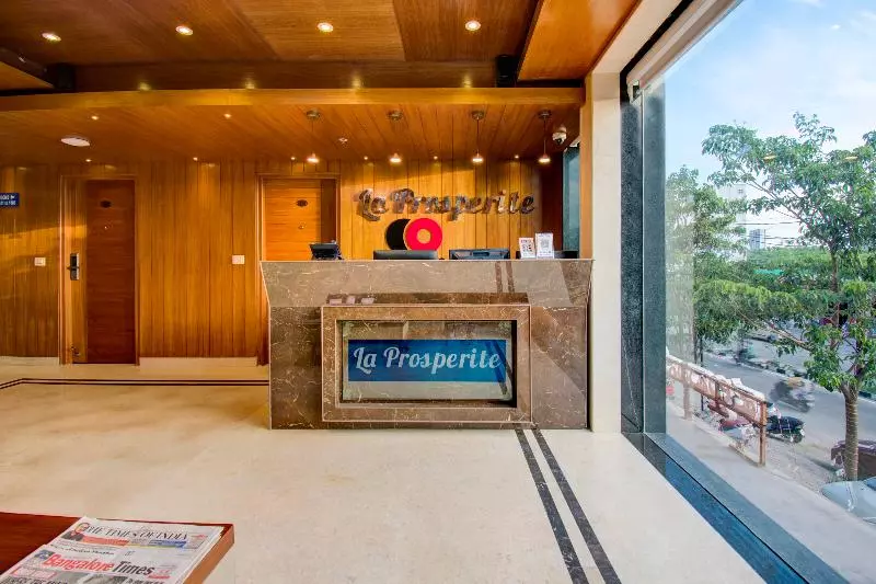 Capital O Premium Hotel La Prosperite Near Royal Meenakshi Mal