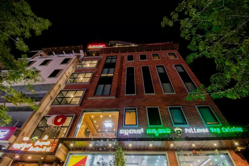 Capital O Premium Hotel La Prosperite Near Royal Meenakshi Mal