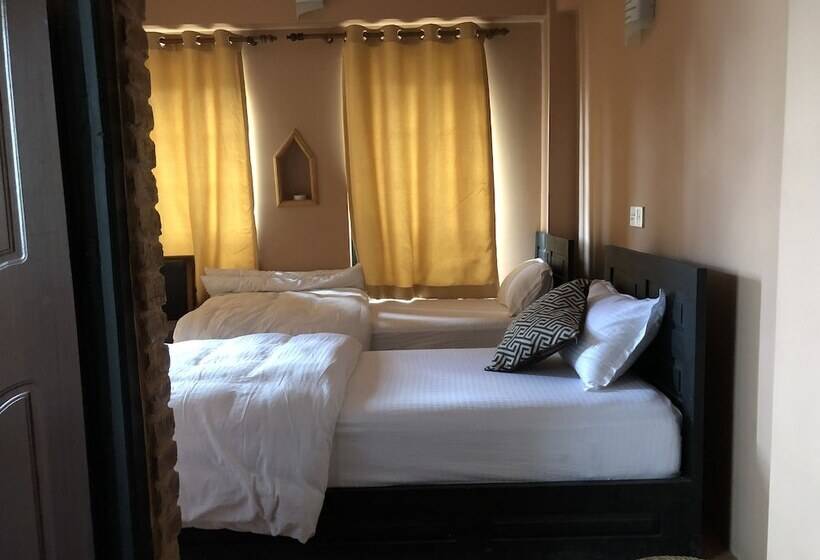 تختخواب و صبحانه Tashi Delek Guest House