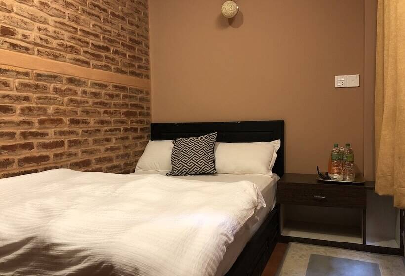 تختخواب و صبحانه Tashi Delek Guest House