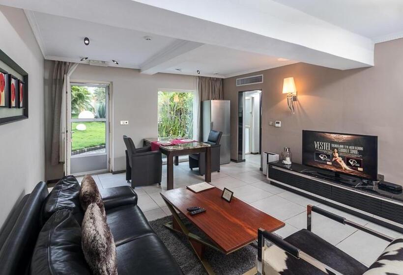 Red Mango Hotel And Apartments