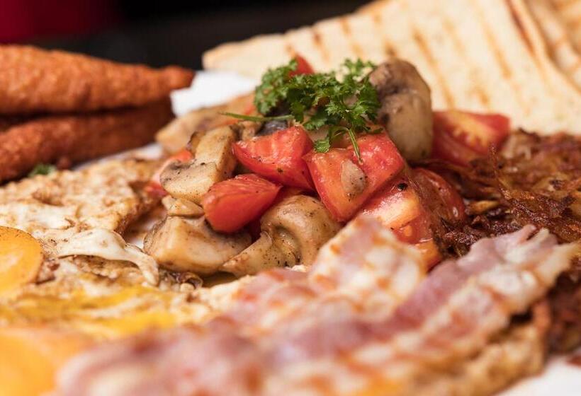 Red Mango Hotel And Apartments