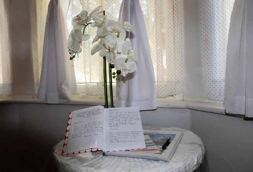 פנסיון Cathy's Guest House