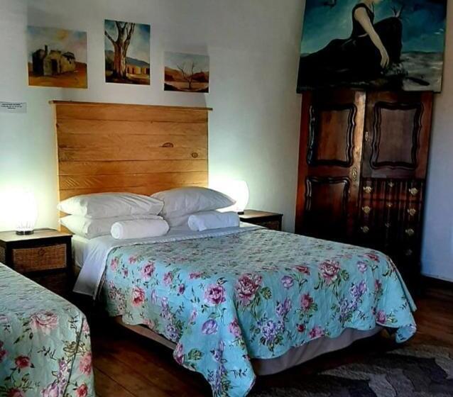 פנסיון Cathy's Guest House