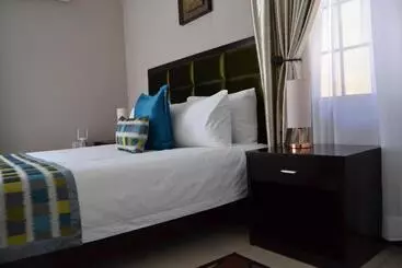Triple Palms Bed And Breakfast