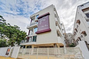 ホテル Capital O 28475 Elite Homes