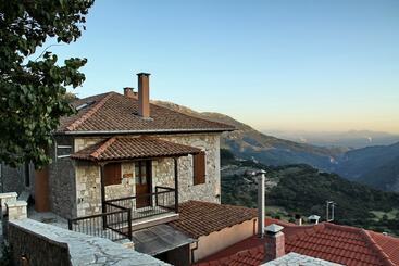 Отель Loussiou Nymfes