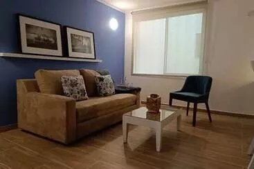 Отель Boutique Confort Suites