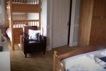 Hotel The Top House Inn