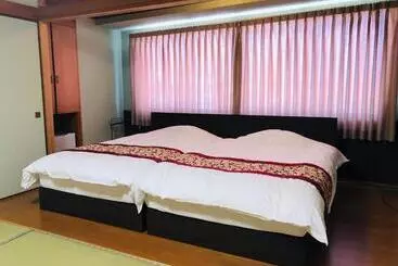 בית מלון כפרי Takasago