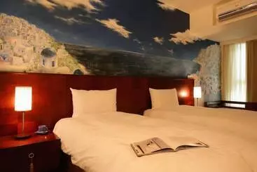 هتل In One City Inn