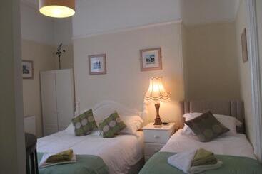 ホテル Caledonia Guest House