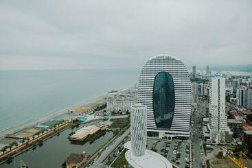 アパートホテル Batumi Orbi City Sea View