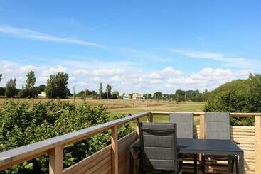 Жильё для туристов Functional And Cozy Apartment At Abbekas Golf Course