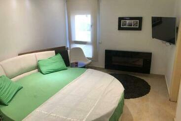 هتل آپارتمان Ground Floor Chalet With Garden   Pool View   Marina Wadi Degla Village