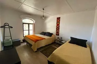 تختخواب و صبحانه Caminandes Hostal