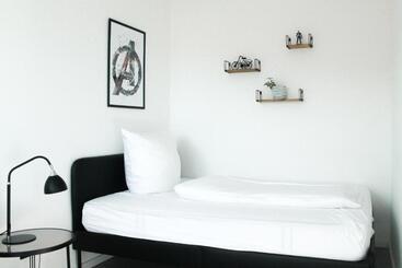 Жильё для туристов Marvel Apartment   Für Freunde & Familien, Stadtnah, Parkplatz, E Ladestation, Gitterbox Für Fahrräd