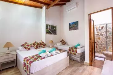 ホテル Entre Palmas Casa