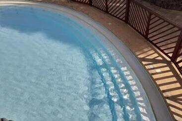 هتل آپارتمان Le Studio Les Tropiques Au Village Manganao