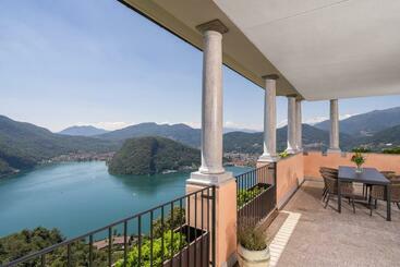 ツーリストアパートメント Swiss Hotel Apartments Collina D Oro Resort