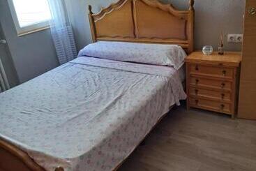 تختخواب و صبحانه Habitación Doble En Apartamento De 3 Habitaciones