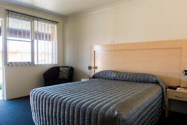 Мотель Cherry Blossom Motor Inn