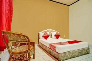 Hotel Capital O 92214 Beristera