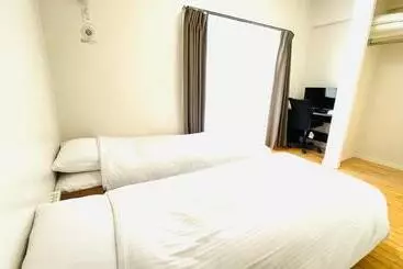 Lägenhet Condominium Golf Golf Tsuboya