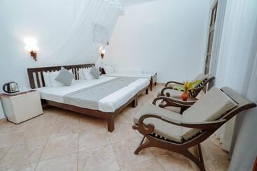 בית מלון כפרי Blue Sky Beach Resort