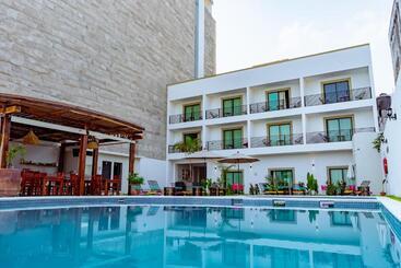 호텔 Santa Martha Bungalows