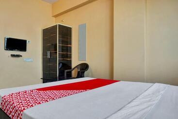 Отель Oyo Flagship Savanna Garden Lodge