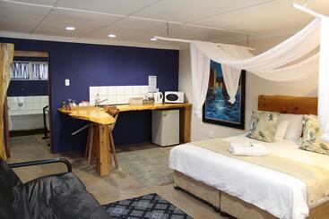 مبيت وإفطار Tidewaters River Lodge