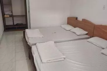 تختخواب و صبحانه Nhà Nghỉ Phú Quý