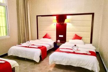 호텔 Xishuangbanna Aerial Garden Daijiangnan Mekong River South Business