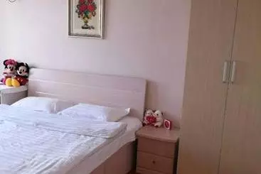 Apartaments turístics Dalian Xiuzhu Mansion Apartment