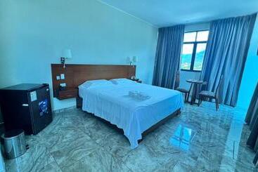 Caruzo Hotel And Suites