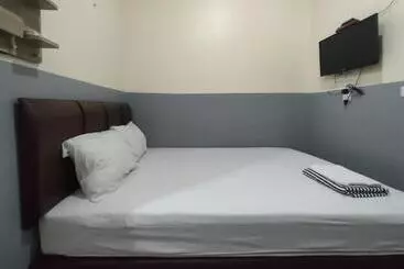 Hotelli Puspiptek Residence Syariah Mitra Reddoorz