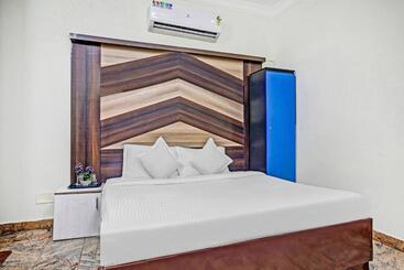 Fabhotel Neethu Residency   Nr Avm Film Studio