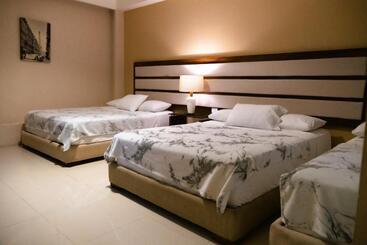 아파트호텔 Infinity Suites Habitación Triple