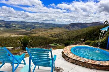 تختخواب و صبحانه Chalés Da Pedra