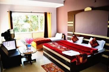 בית מלון כפרי Sambyal Wings