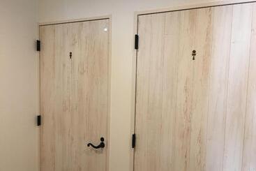 Отель Shironoshita Guesthouse