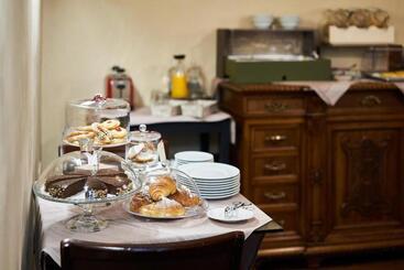 호스텔 Locanda Delle Mercanzie