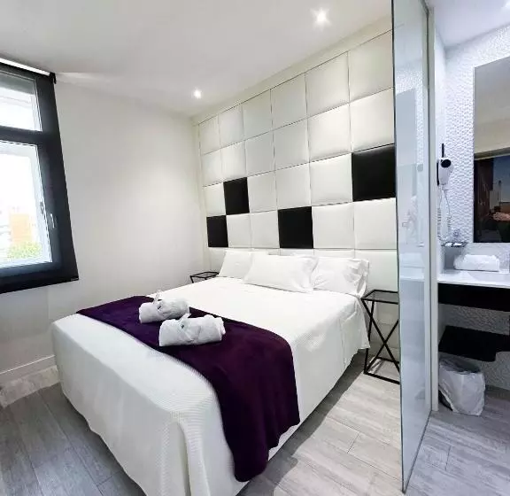 Отель Es Urbanos N Avenida De España