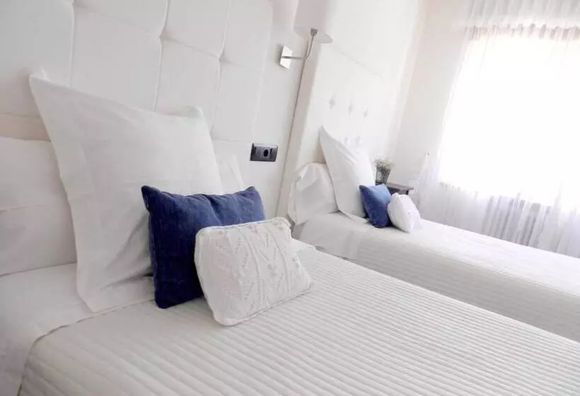 فندق Hostal Carlos V