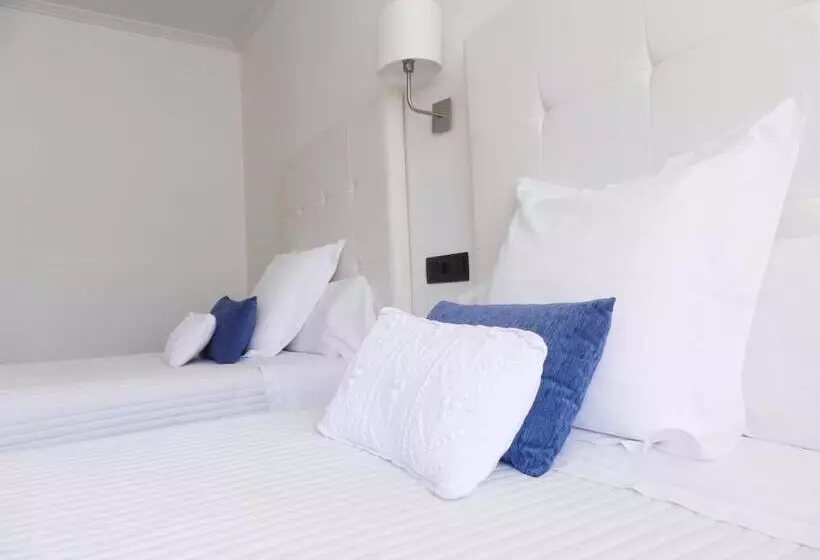 فندق Hostal Carlos V